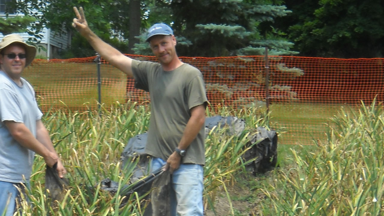 farmer giving peace sign